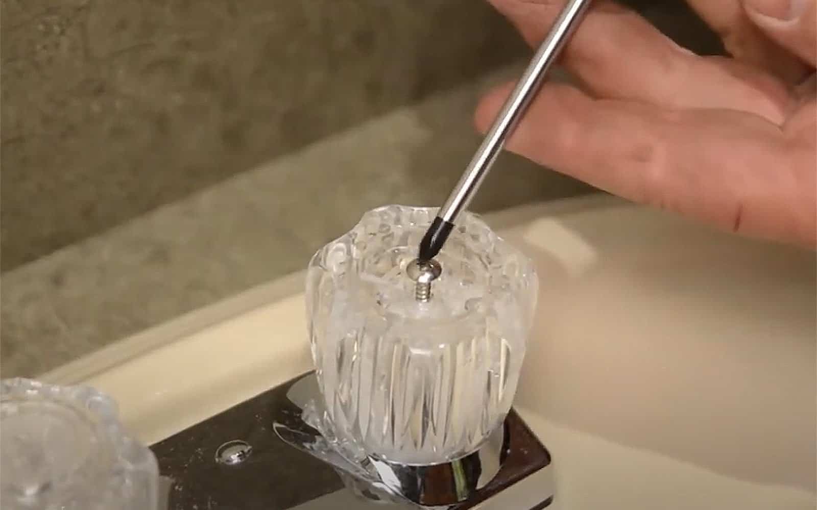 Unscrew the Set Screw-one step of Remove a Faucet Handle