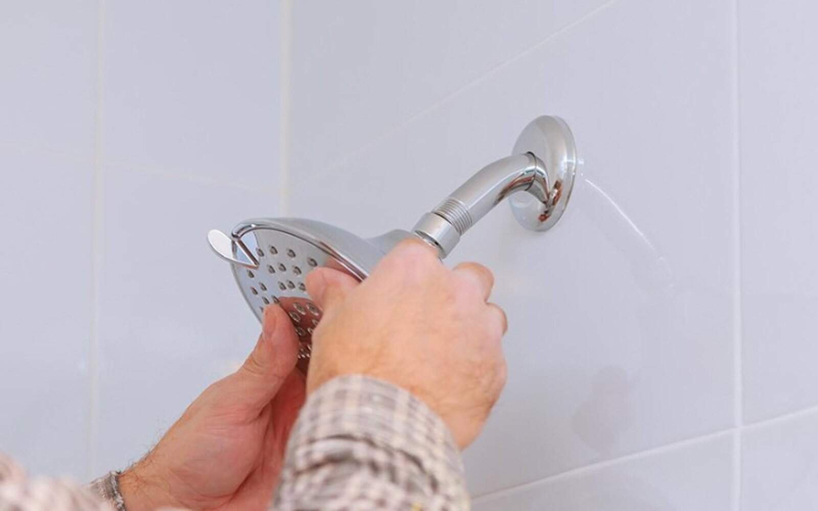 Give your shower arm a gentle wiggle for testing