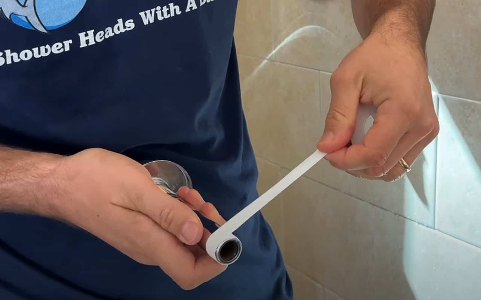 Install shower arm - Wrap 2-4 layers of pipe thread tape clockwise on both ends of arm
