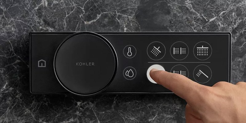 A modern digital shower control panel from Kohler, showcasing smart home integration and precise water control.