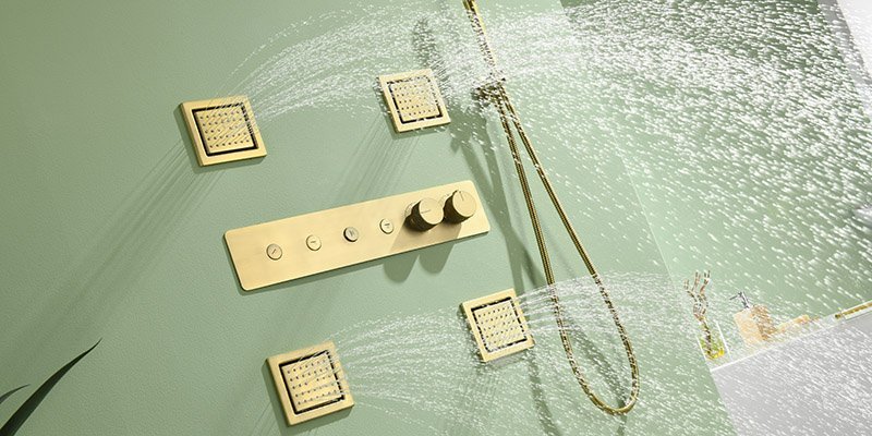 Multiple wall-mounted body jets delivering targeted water streams for a therapeutic, spa-like shower experience.