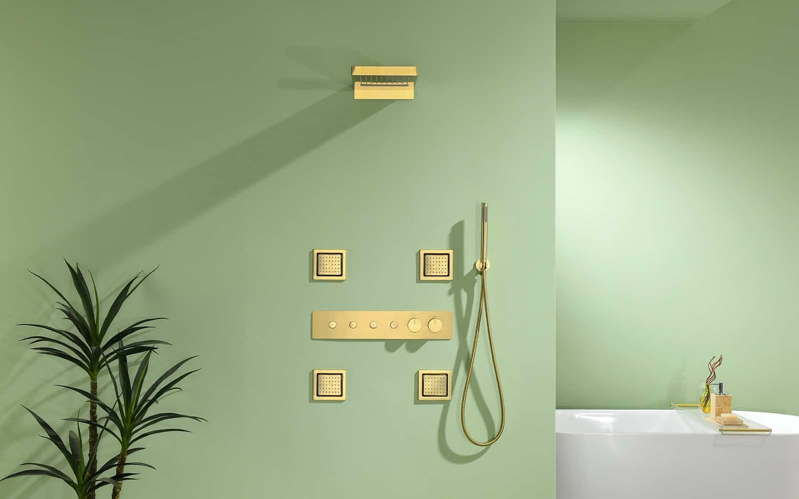 Concealed shower column in brushed gold finish