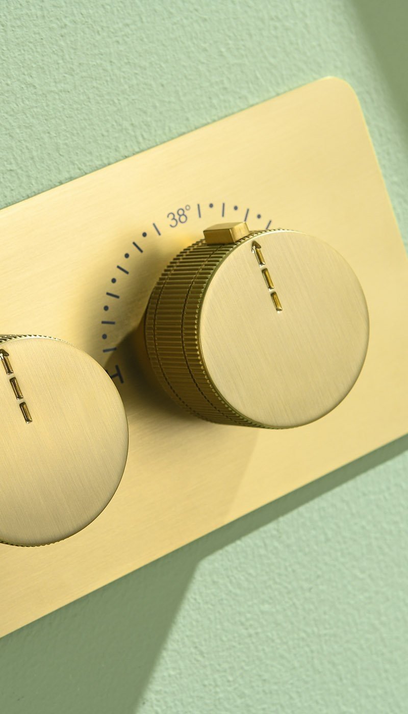brushed gold shower valve close view