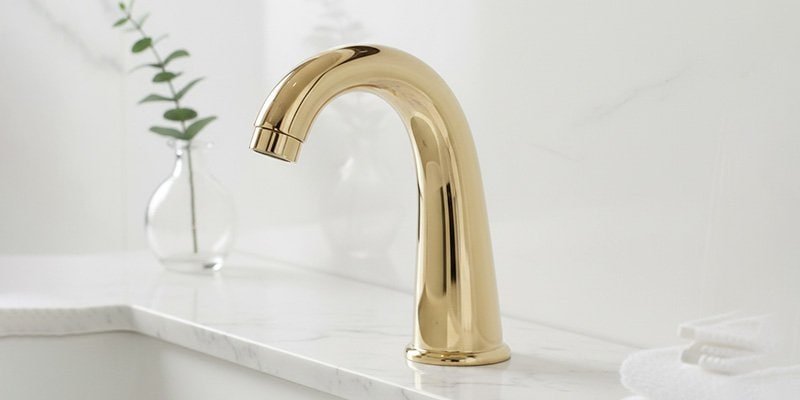 a polish gold bathroom faucet
