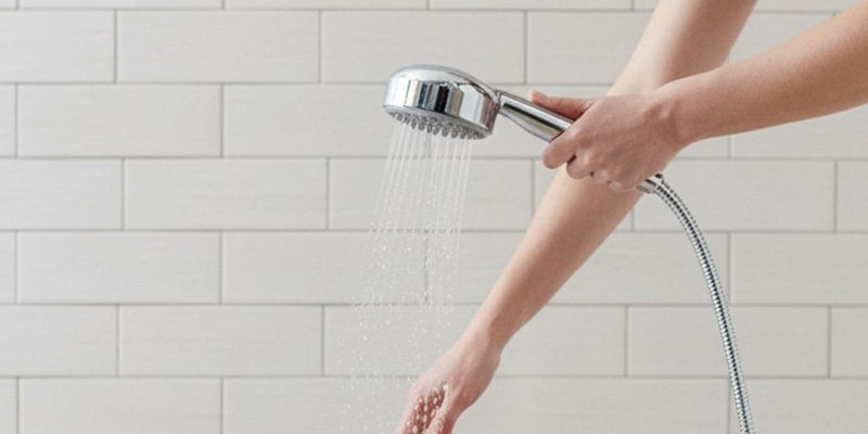 using a hand shower